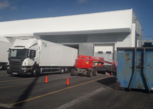 TRATAMIENTO ANTICORROSIVO EN FACHADA DE NAVE INDUSTRIAL METÁLICA